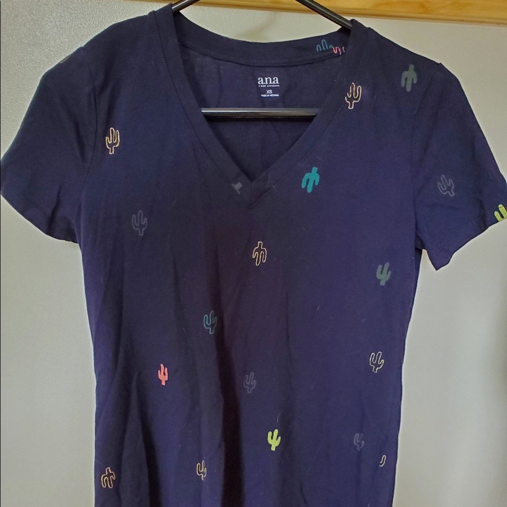I’m selling a dark blue cactus shirt!